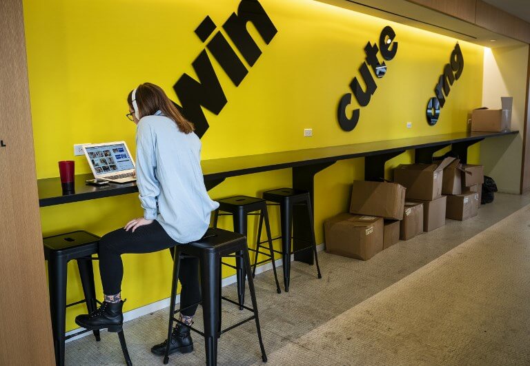 An employee works on a laptop at BuzzFeed headquarters, in New York City. . Source: Drew Angerer/Getty Images/AFP