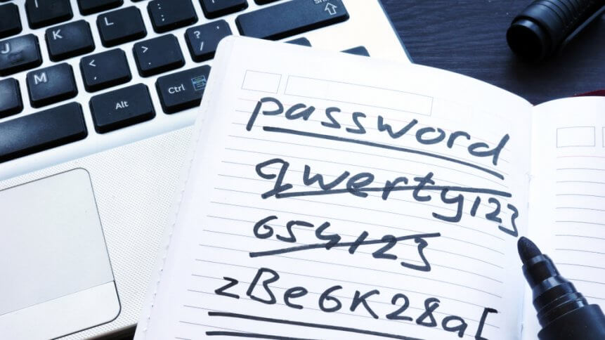 Strong and weak easy Password. Note pad and laptop.
