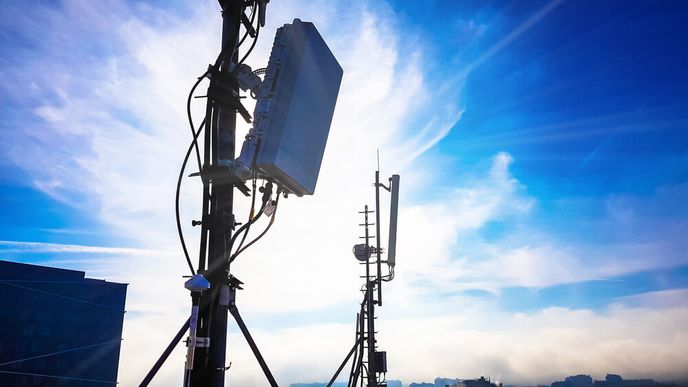Silhouette of 5G smart cellular network antenna base station