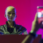 'Sophia the Robot' is seen on stage before a discussion by Hanson Robotics about Sophia's multiple intelligences and artificial intelligence (AI) at the RISE Technology Conference