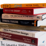 Stack of books related to startups