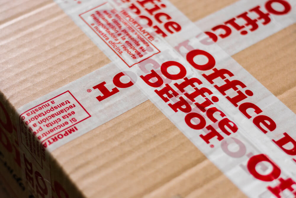 Office Depot logotype printed on cardboard box security scotch tape
