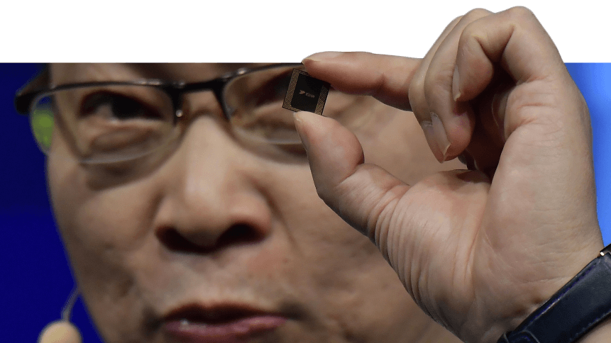 Richard Yu, head of Huawei's consumer business, presents a Kirin 990 5G chip set at the IFA