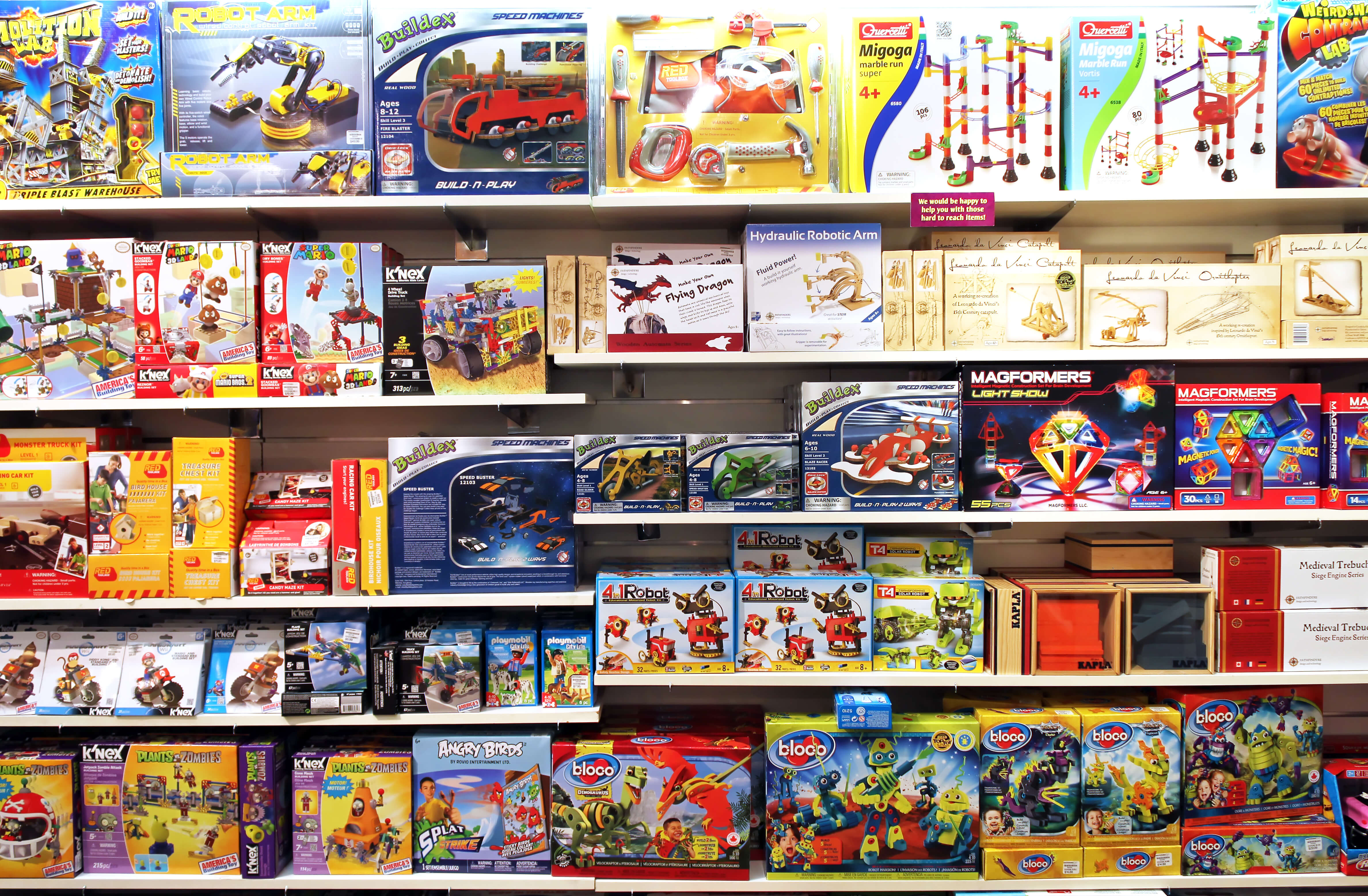 ariety of construction toys on shelves in a store. The Lego Group is the major manufacturer of construction toys in the world.