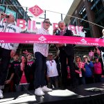 Macklemore, T-Mobile President and CEO Mike Sievert, Mariners Chairman John Stanton and Rick Rizz cut the ribbon to officially open T-Mobile Park