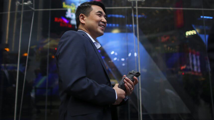 Zoom founder Eric Yuan in front of the Nasdaq building after Zoom's opening bell ceremony on April 18, 2019