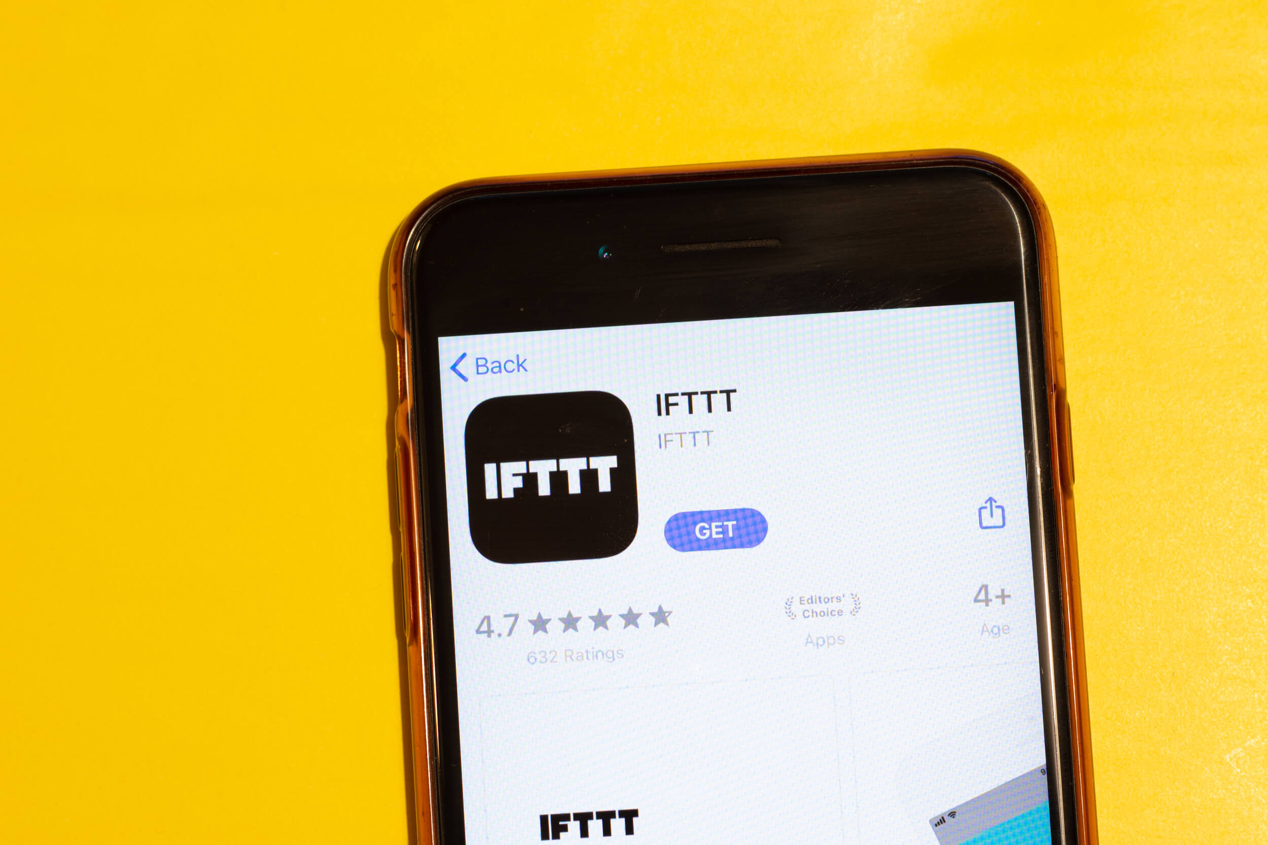 IFTTT app icon on phone screen, Illustrative Editorial