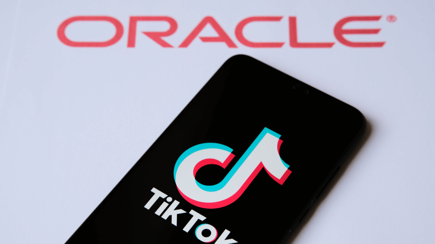 TikTok and Oracle partnership concept photo. TikTok logo seen on the smartphone and Oracle company logo seen on the blurred background