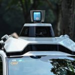Who should pay if an autonomous vehicle causes an accident: the owner, the carmaker, or the developer of the AI?