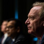 Microsoft President Brad Smith listens during a Senate Intelligence Committee hearing on the 2020 Solarwinds hack that resulted in a series of major data breaches within major corporations