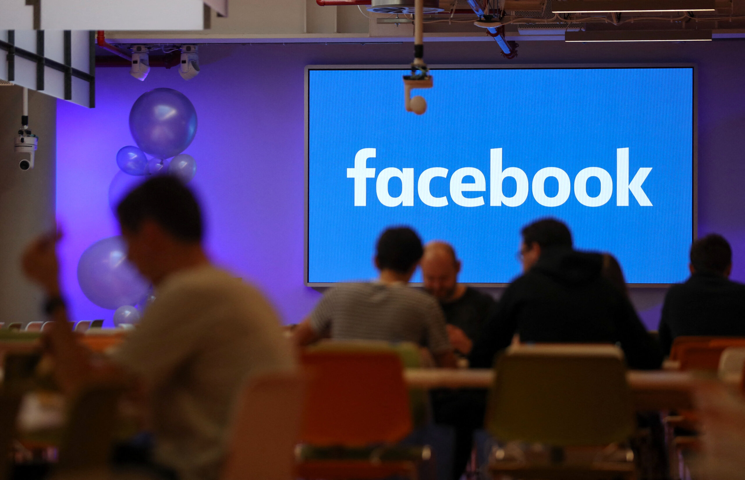 Facebook's data centers are powering machine learning tasks, including the algorithm that handles Facebook’s content recommendations. (Photo by Daniel LEAL-OLIVAS / AFP)