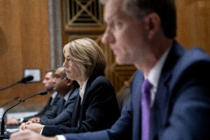 Vanessa Pappas (C), chief operating officer for TikTok, listens during a US Senate Homeland Security and Governmental Affairs Committee hearing regarding social media's impact on homeland security, on Capitol Hill in Washington, DC, on September 14, 2022.