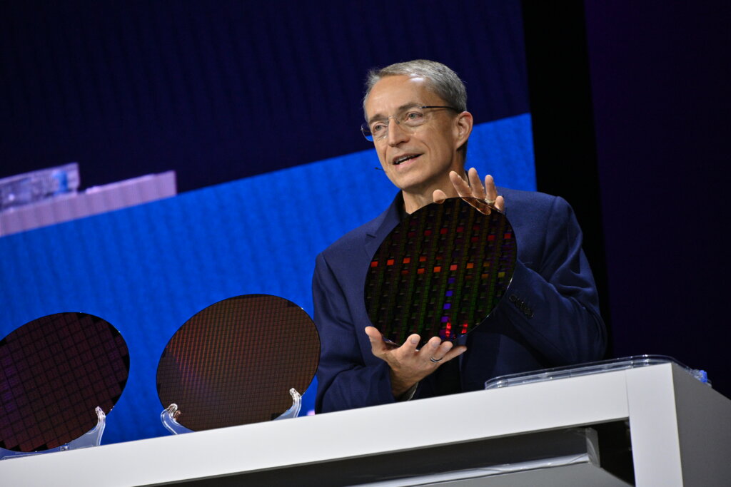 Intel CEO Pat Gelsinger holds up a wafer with Tunnel Falls quantum computing processors. Tunnel Falls is Intel’s 12-qubit quantum research chip. Intel has made it available to the quantum research community. Gelsinger displayed the wafer on Tuesday, Sept. 19, 2023, at Intel Innovation in San Jose, California. (Credit: Intel Corporation)