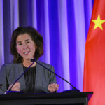 Raimondo warns against unwanted access to US cloud technology while acts to block use of US tech for AI by China due to security concerns. (Photo by CARLOS BARRIA/POOL/AFP).
