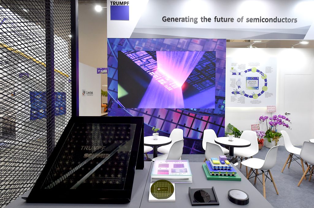 TRUMPF exhibition booth at SEMICON Taiwan 2026 displaying substrate and chip packaging samples under a banner reading Generating the future of semiconductors. Photo by TRUMPF